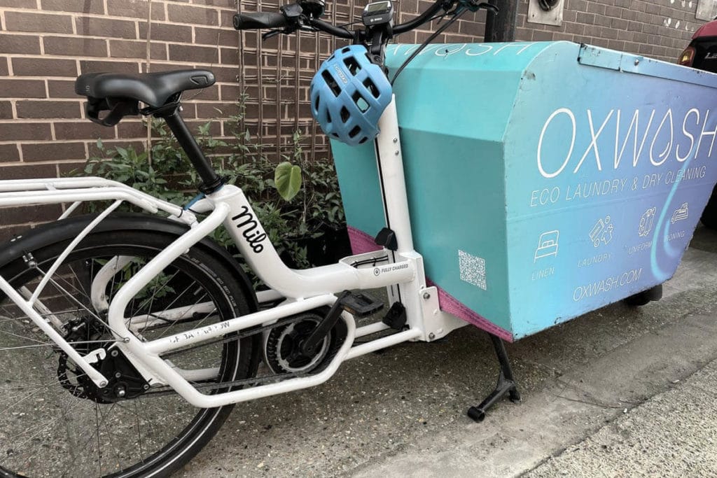 Textile cleaning service provider Oxwash as a user of the Enduo Cargo drive for heavy-duty cargo bicycles