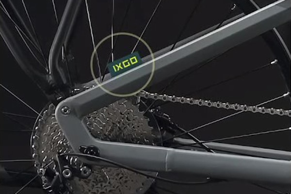 Small tag on the seat stay with the brand name to identify ebikes of the brand IXGO