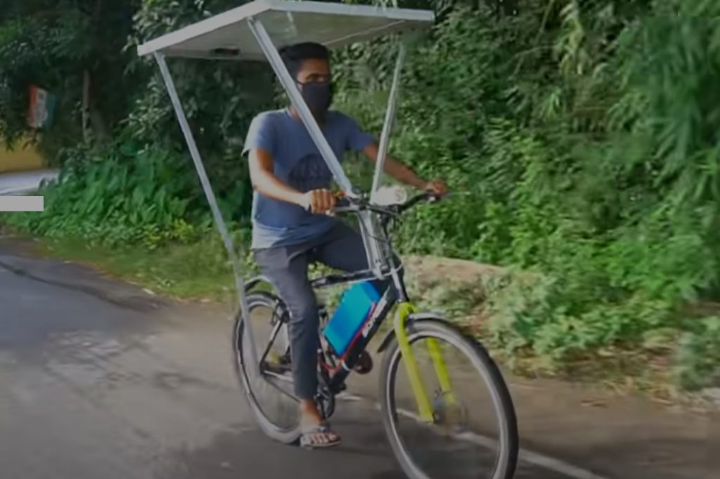 E bike with solar panel mounted on the canopy